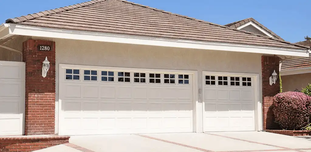 Residential garage door repair service for a double garage door in Baltimore, MD
