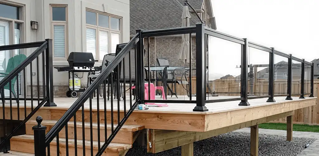 Handrail installation on a deck staircase for safety and code compliance in Baltimore, MD