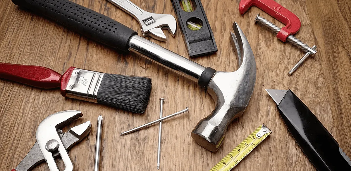 Handyman tools laid out for home repair and maintenance work in Baltimore, MD