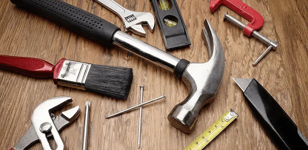 Handyman tools laid out for home repair and maintenance work in Baltimore, MD